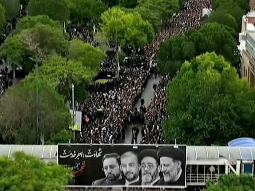 Iran helicopter crash latest: Ebrahim Raisi’s funeral procession underway as US says he had ‘blood on his hands’