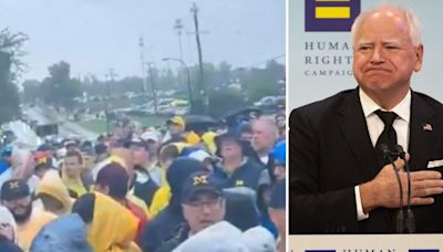 Timz Walz booed by Michigan fans who were forced to wait in rain while his motorcade arrived at Minnesota game: Watch