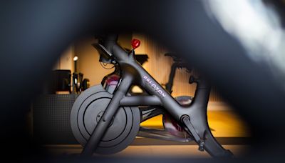 Peloton Tumbles to Record Low After Announcing CEO Exit, Layoffs