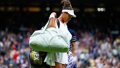 Naomi Osaka fights back tears after defeat to Emma Navarro