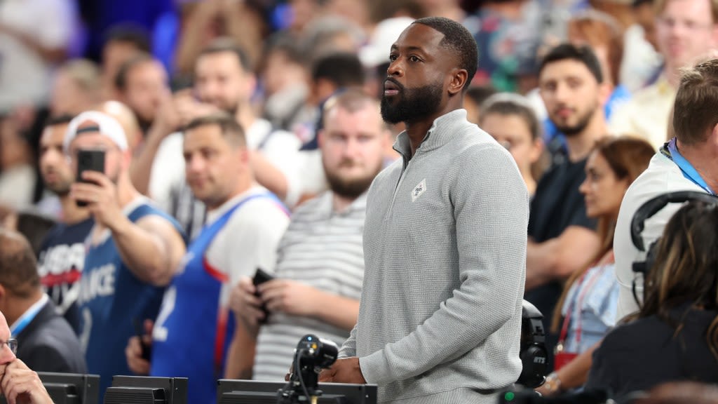 USA Basketball's thrilling gold medal win had analyst Dwyane Wade unable to sit: 'My pants are a little tight'