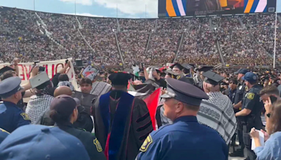 Protesters interrupt University of Michigan commencement | CNN