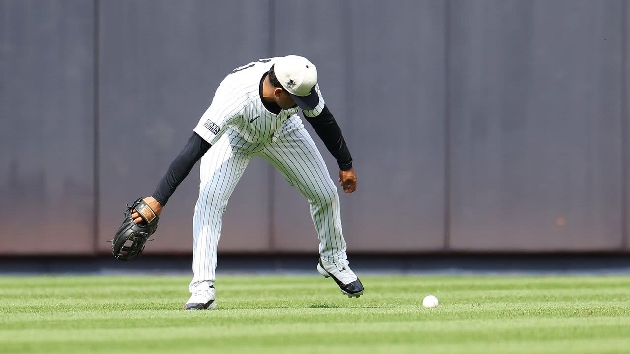 Yankees manager Aaron Boone addresses Trent Grisham for lackadaisical play