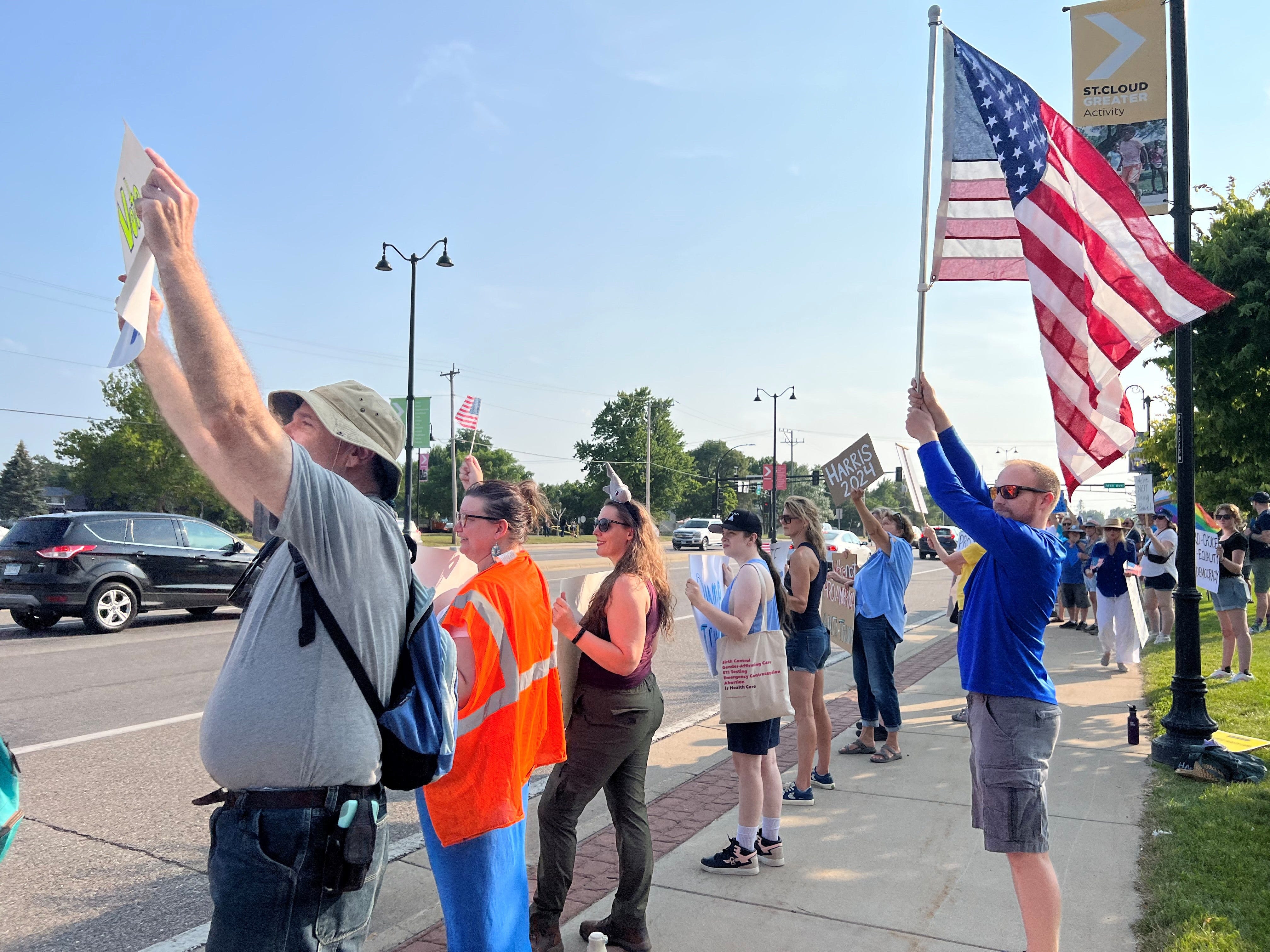 Anti-Trump protesters gather in downtown St. Cloud during Trump rally