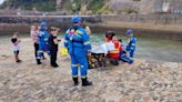 Tombstoner rushed to hospital after jumping off harbour at low tide