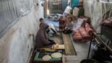 In Gaza, Palestinians return to a shelter scarred by war