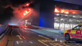Luton Airport fire – live: Flights suspended for most of day as 40,000 passengers affected