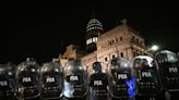 Argentina’s riot police clash with protesters in capital’s streets over president Javier Milei’s reforms