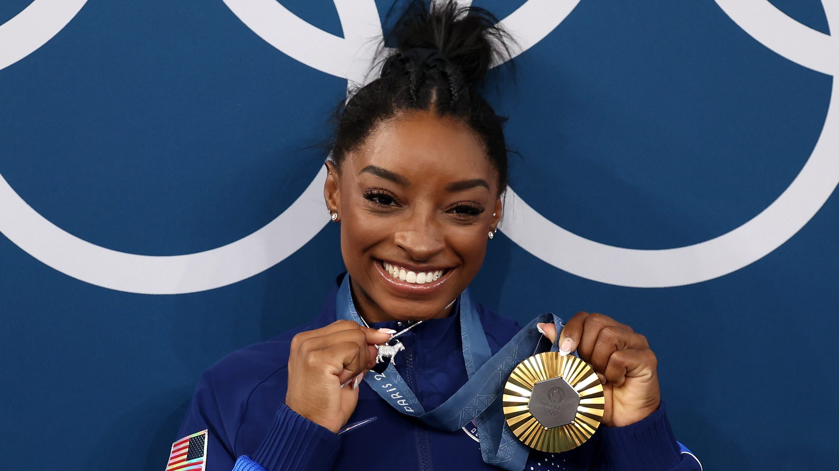 Simone Biles Claims “Haters Hate” That People Call Her The G.O.A.T., Which Inspired Her Necklace