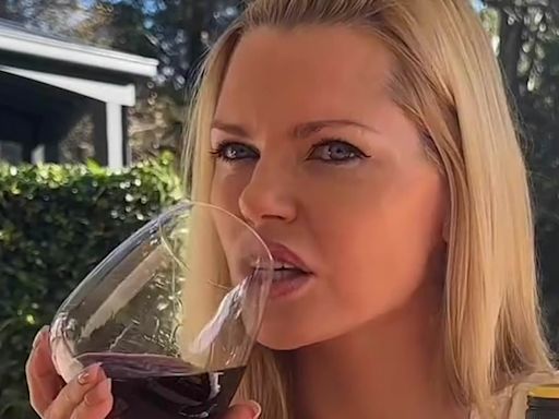 Sophie Monk shows off her ample cleavage as she spruiks budget wine