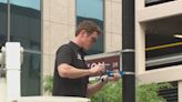 IndyCar driver signs go up in downtown Indianapolis