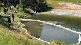 Car with five people inside plunges into hot acidic lake at national park