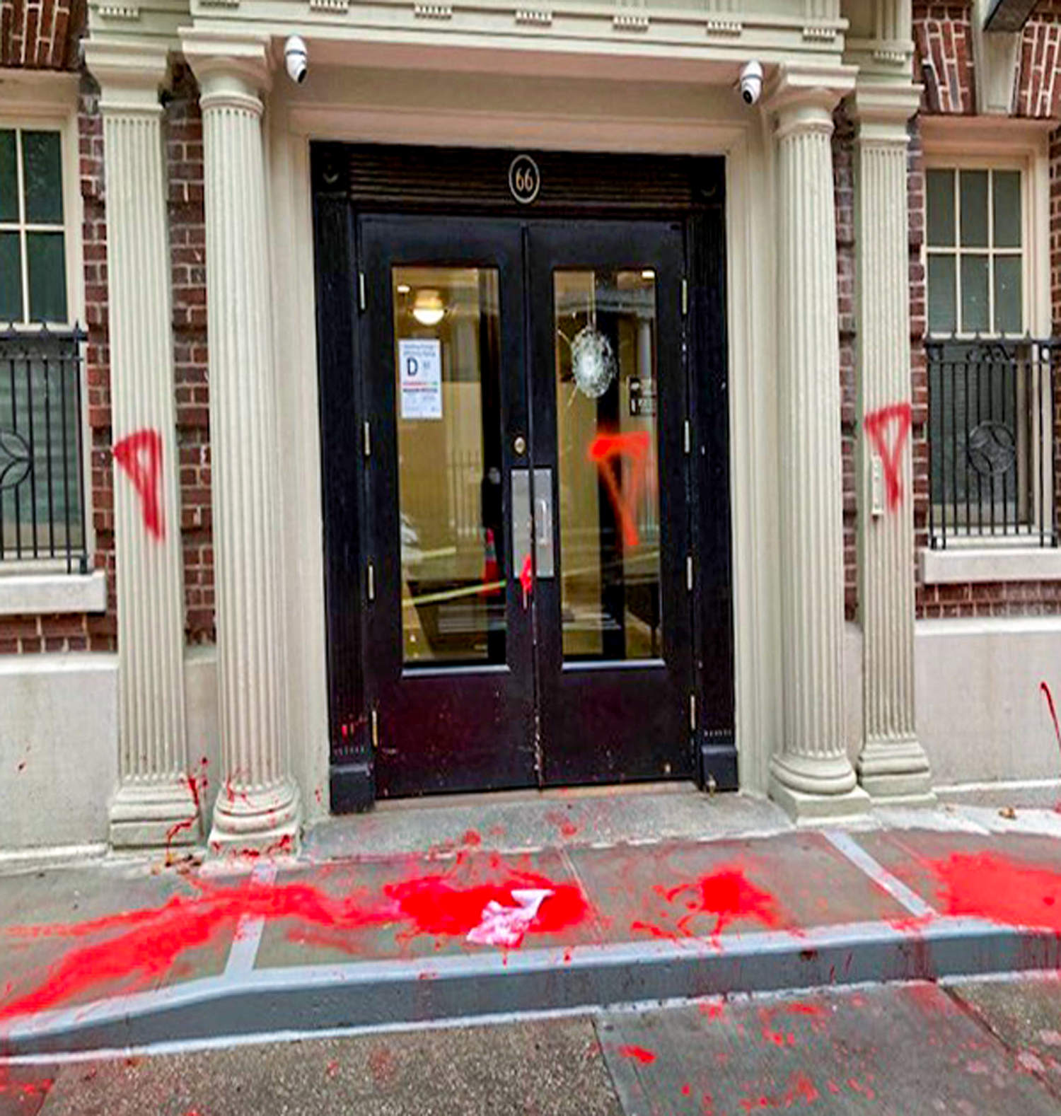 Columbia University exec's New York apartment building vandalized with red paint and crickets