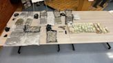 Two men arrested; gun, drugs, and cash recovered from investigation