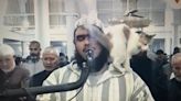 Adorable video of cat cuddling up to an Imam leading Ramadan prayers in Algeria goes viral (VIDEO)