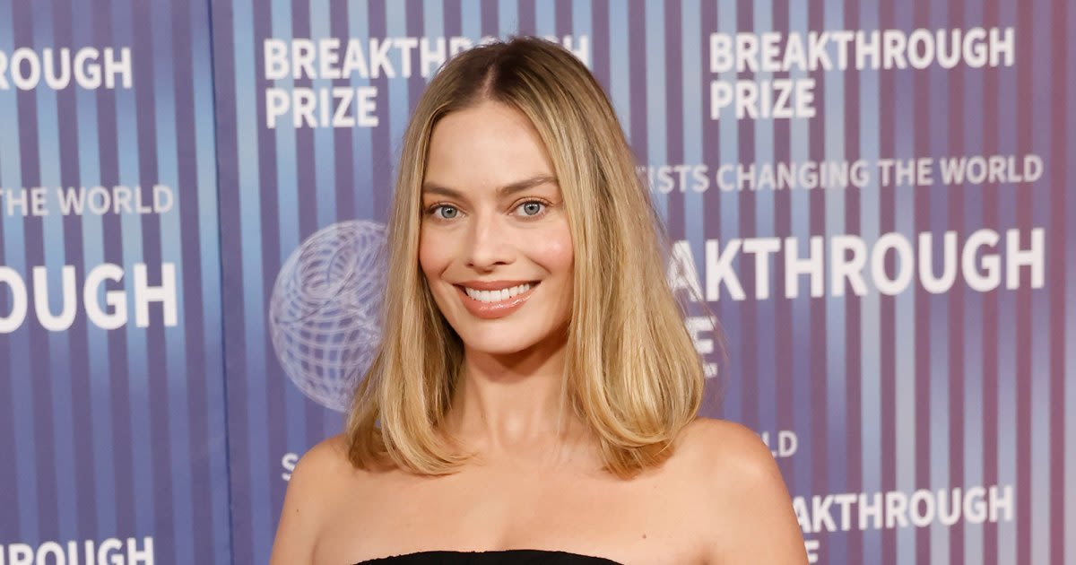 Margot Robbie Wows in Yellow Bridesmaid Dress at Friend's Wedding