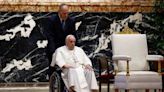 Pope unable to walk around papal plane due to knee pain
