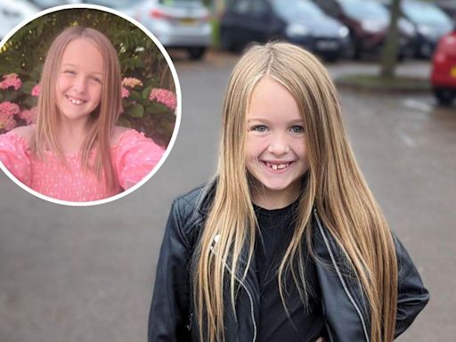 Eight-year-old girl donates 12 inches of her hair to cancer charity