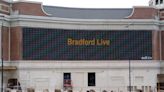 The words 'Bradford Live' appear on big screen of iconic city centre building