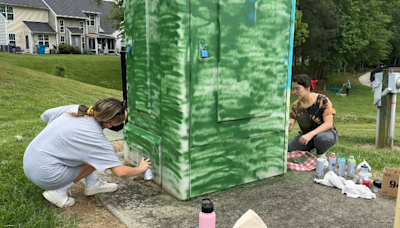 Video: Queens University artists make over utility boxes