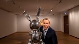 A sculpture by Jeff Koons has become the first 'authorized' artwork on the moon