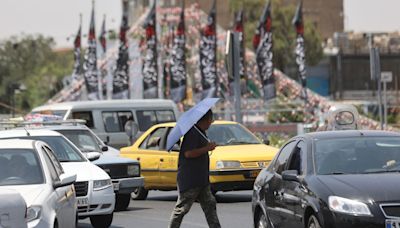 Heat wave forces Iran to shutter government offices and banks. Electricity consumption soars