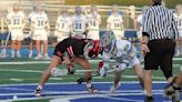 Wildcats’ lacrosse rally topples the champs