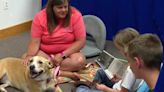 'Read to a Dog': Omaha Public Library gets kids reading over the summer