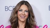 Liz Hurley oozes glamour in plunging hot pink gown as she hits the red carpet