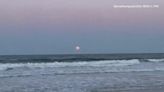 WATCH: Full Pink Moon captured during sunset on Florida beach