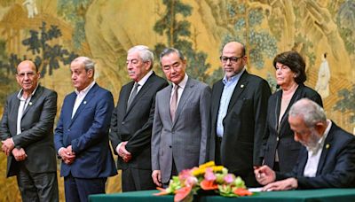 Palestinian factions agree to end division in pact brokered by China