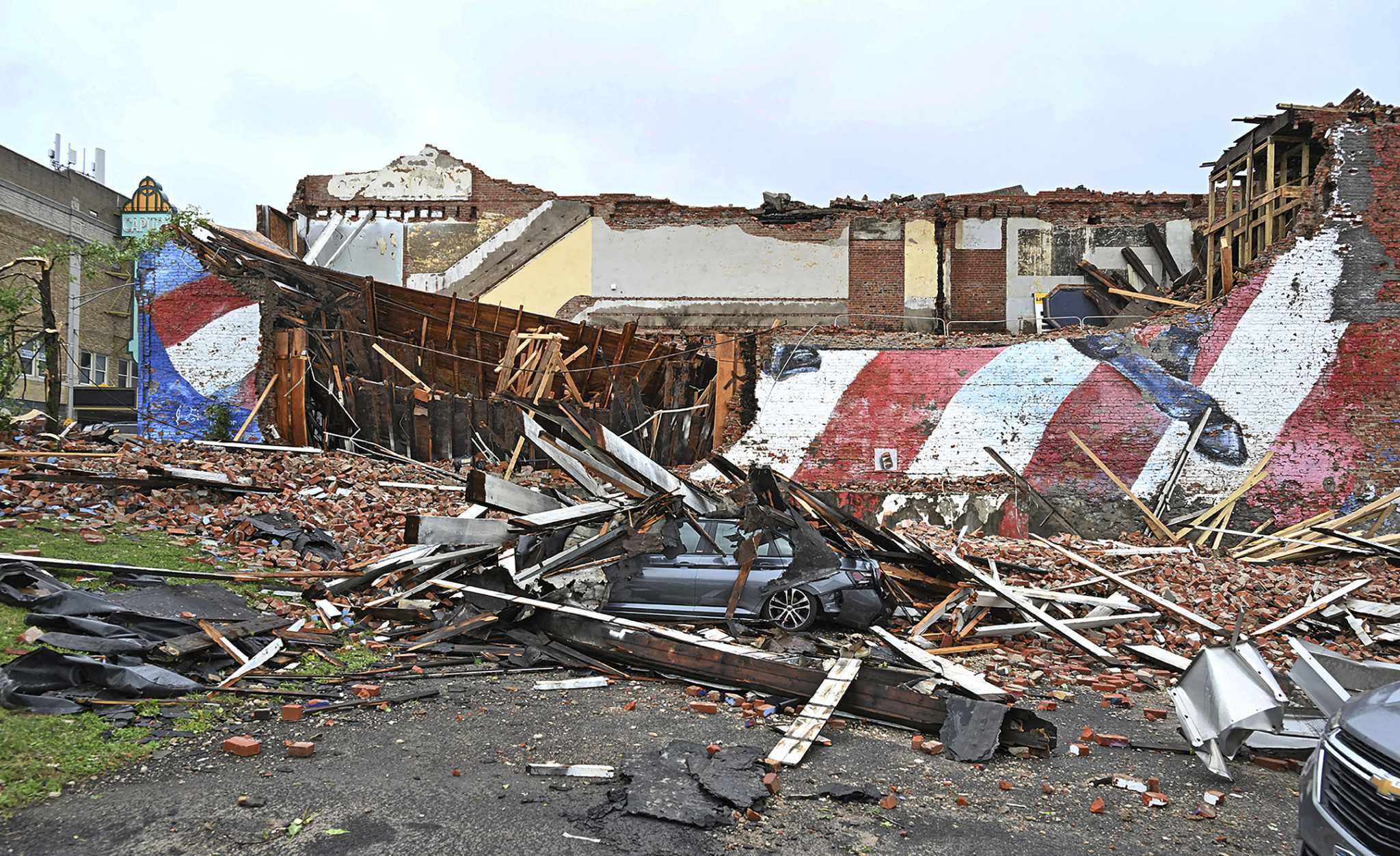 Storms flood the Ozarks and strand drivers in Toronto. New York town is devastated by tornado