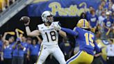 J.T. Daniels outplays Kedon Slovis in first half of West Virginia-Pittsburgh