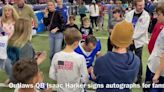 2024 Billings Outlaws sign autographs for fans after season-opening win