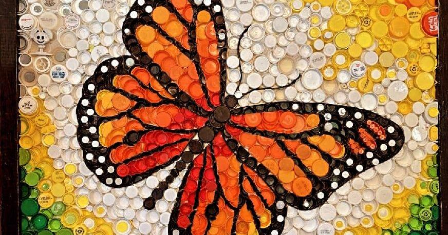Monarch butterfly art made of plastic bottle caps on display in Antigo