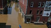 Vermont capital submerged in floodwaters with dam on verge of capacity