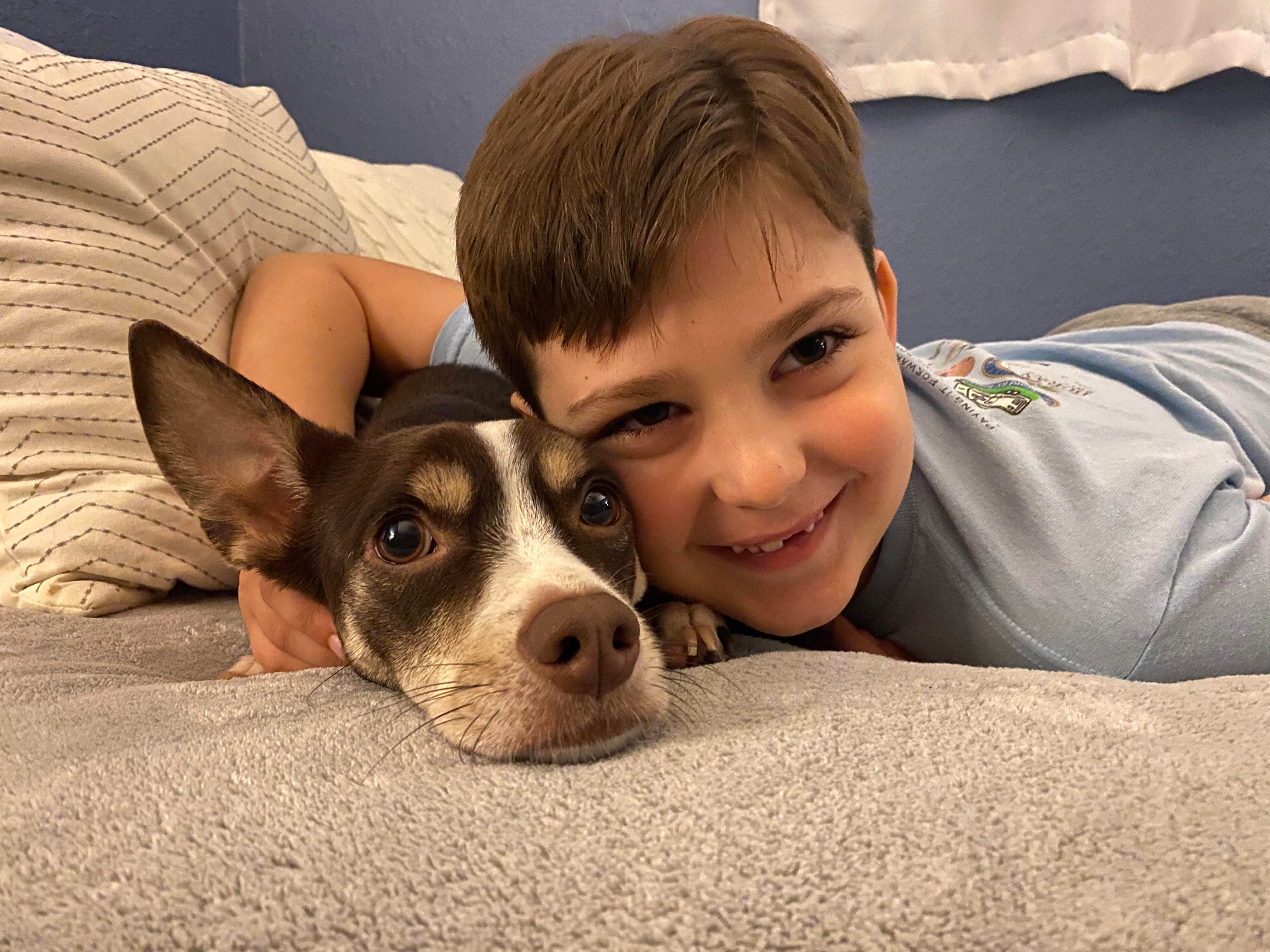 I adopted a dog for my son when I was a single mom. I found ways to work it into my budget, and it was so worth it.