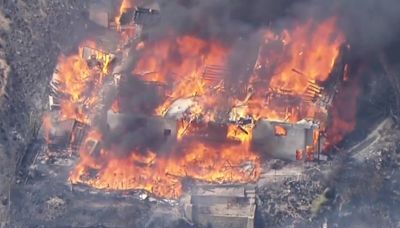 California wildfire burning down homes in San Bernardino County; Evacuation underway