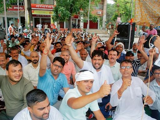 Karnal: Outsourced staff shift dharna site