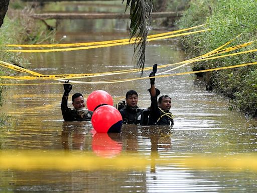 Police divers recover smartphone in ditch near where murder victim Nur Farah Kartini was found