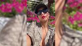 Malaika Arora Can't Go Wrong With A Red Lip And A Monogram Gucci Holiday Shirt And Bralette In Spain