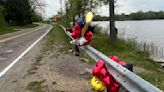 Balloons placed where young boy's body was pulled from the Flint River