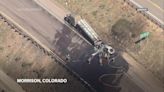 A fiery tanker crash and hazmat spill shuts down Interstate 70 near Denver