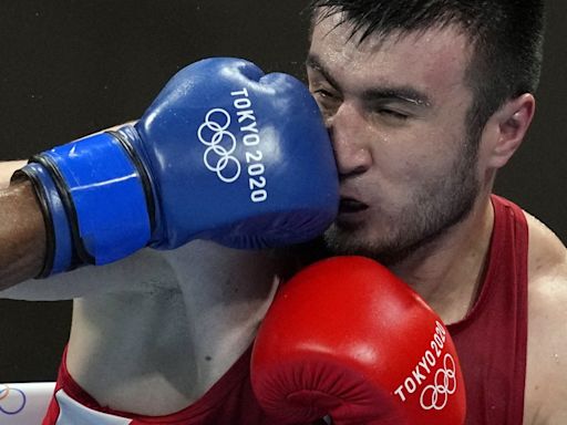 Beleaguered Olympic boxing has a new look in Paris: Gender parity, but the smallest field in decades