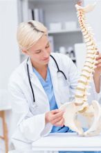 Doctor with Anatomical Spine in Clinic Stock Image - Image of diagnose ...