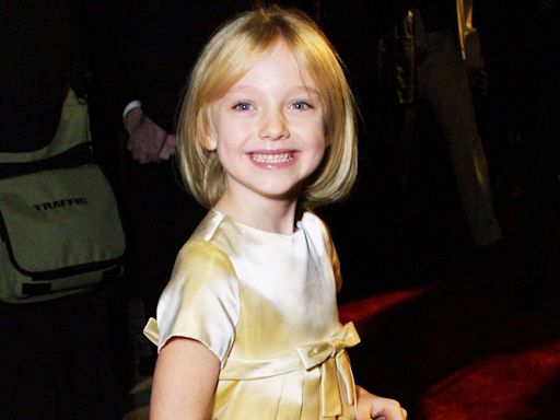 Dakota Fanning Shares Throwback Photo of Herself at 2001 Premiere: 'Always Thinking of This Tiny Girl'