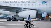 Garuda Indonesia halves debt with restructuring, on track for profit - government