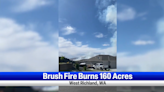 Windy conditions escalate bush fire