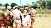 Three religious structures removed in Dhanas amid protest | Chandigarh News - Times of India