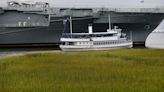 Cruise passengers at Patriots Point leave waves in their wake